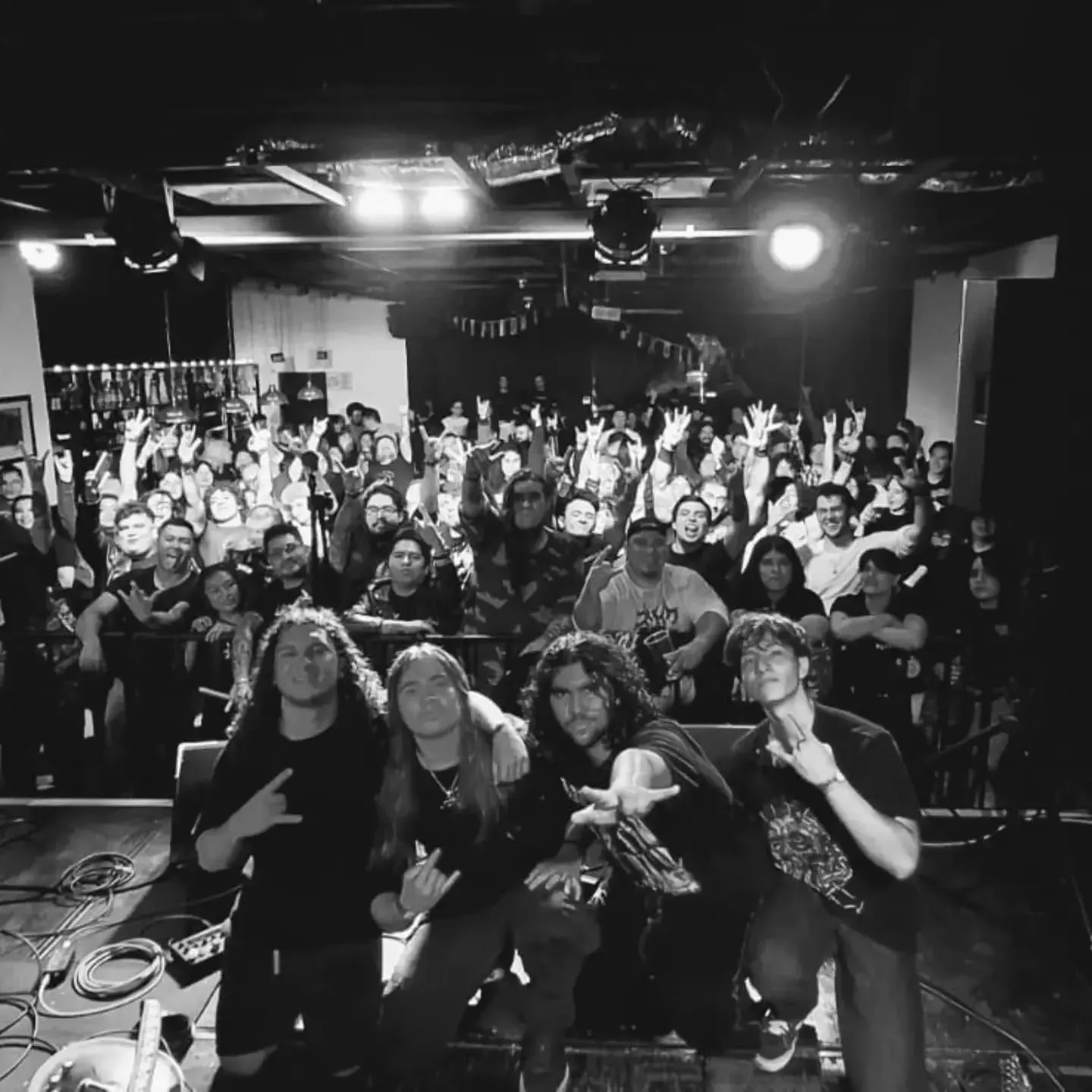 Rustblood stage selfie with the crowd throwing horns