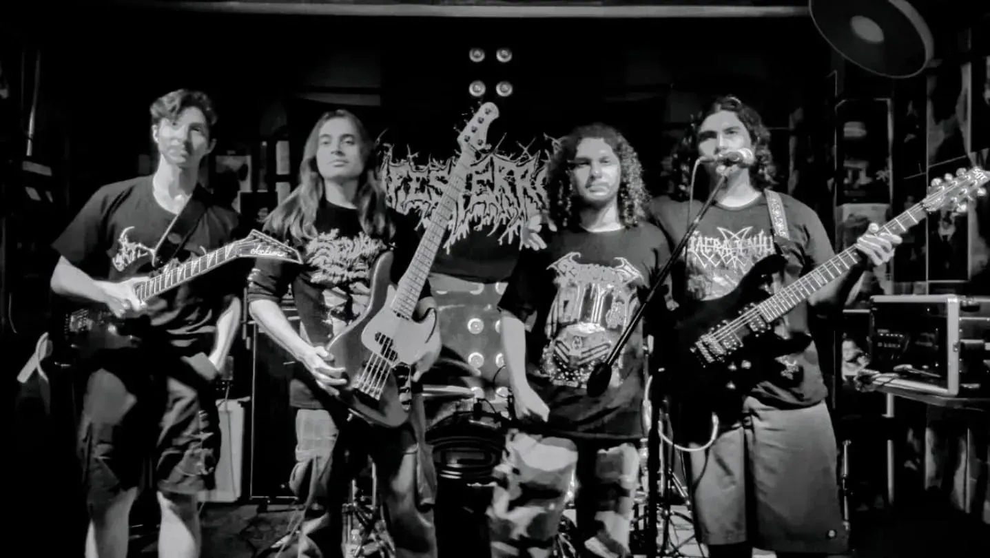 Rustblood black-and-white portrait with instruments on stage